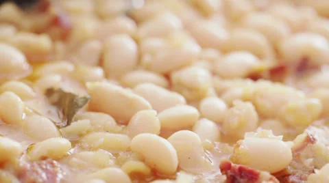White beans steaming in casserole - closeup Stock Footage 35982663