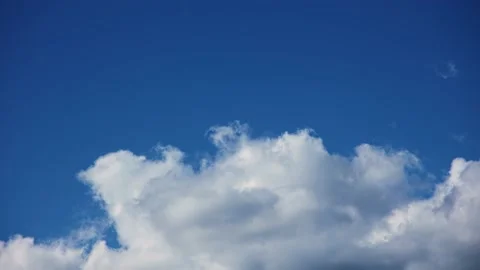White Beautiful Feather Cloud in The Blue Sky Timelapse Stock Footage 235076195