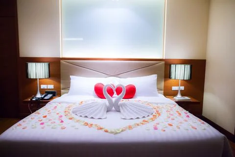 White bed in interior room Stock Photos