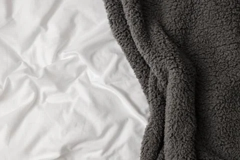 White bed with soft grey bedsheet Stock Photos