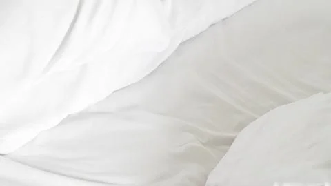 White bedsheets with a smooth clean surface Stock Photos