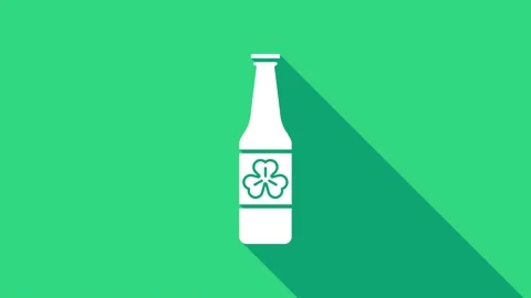 White Beer bottle with four leaf clover icon isolated on green background. Happy Stock Footage 146952022