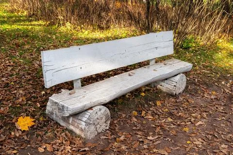 White bench made of logs. Stock Photos