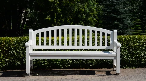 White bench in park Stock Footage 40667772