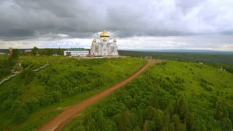White big monastery on  hill and  stormy sky aerial view Vidéo 80282086
