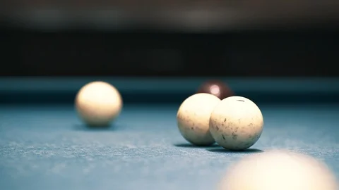 White billiard ball rolling on a table Video stock 99560594