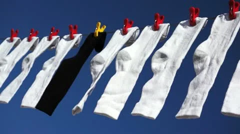 White Black Socks Blowing in Wind Stock Footage 20930765