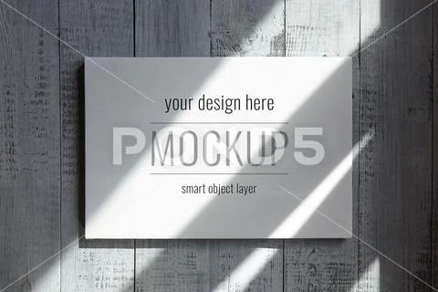 White blank canvas mockup hanging on wall with shadows PSD Template