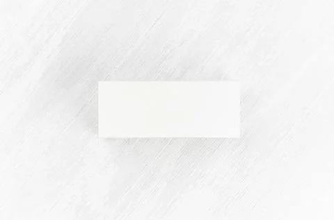 White blank closed paper rectangle box mock up on soft light white wood board Stock Photos