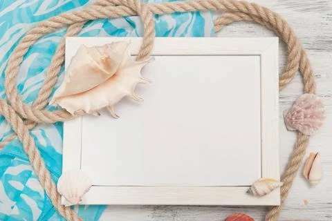 White blank nautical frame with ropes and seashell Stock Photos