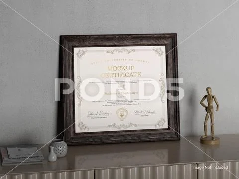 White Blank Photo inside Wooden Frame on a Table Plantilla PSD