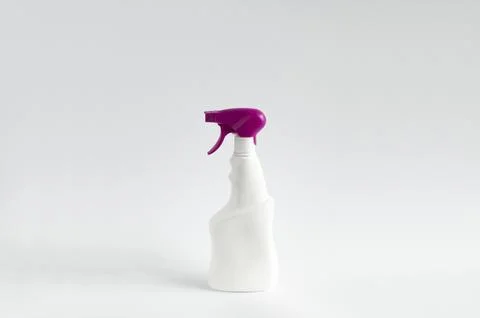White blank plastic spray detergent bottle with a violet sprayer isolated on Stock Photos