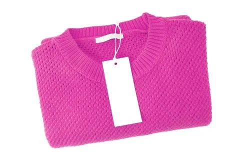 White blank rectangular clothing tag on pink knitted sweater isolated on wh.. Stock Photos