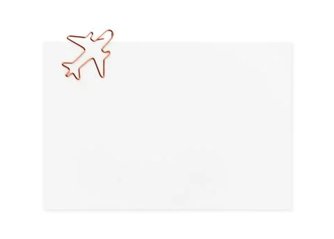 White blank rectangular note paper with metal paper clip in shape of an airpl Stock Photos