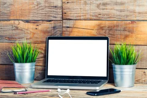 White blank screen on a laptop computer at work. Stock Photos