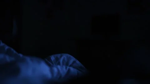 White blanket close up in dark night in the blue light Vidéo 142163233