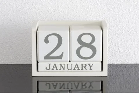 White block calendar present date 28 and month January Stock Photos
