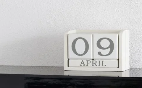 White block calendar present date 9 and month April Stock Photos
