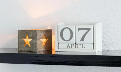 White block calendar present date 7 and month April Stock Photos