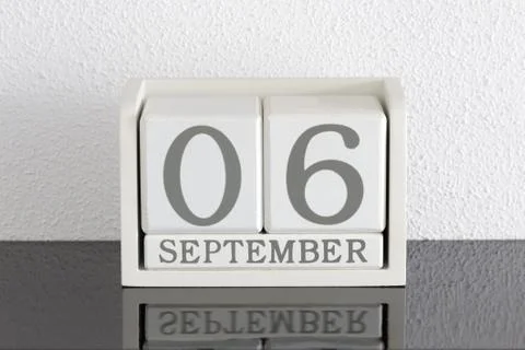 White block calendar present date 6 and month September Stock Photos