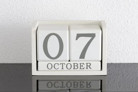White block calendar present date 7 and month October Stock Photos
