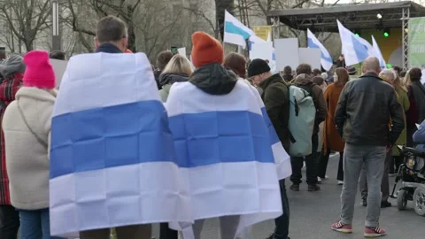 White-blue-white anti-war Russian flag for peace #free Navalny Demo Berlin 4K Stock Footage 310663537