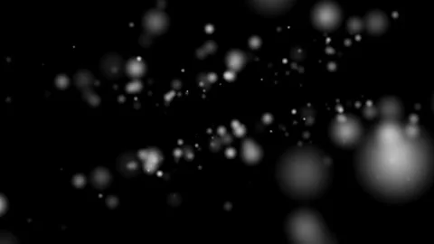 White blurred particles floating in dark black empty space Video stock 333113906