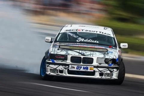 White BMW E36 in a speed performance Stock Photos