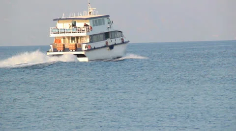 White Boat sailing away Stock Footage 25135402