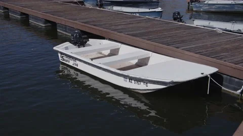 White Boat Tied to Dock Video stock 200799783