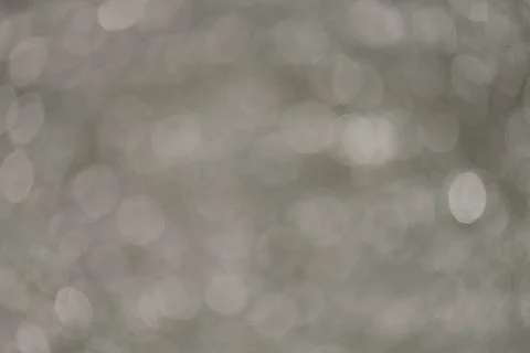 White bokeh on abstract light background Stock Photos