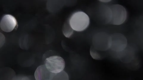 White bokeh leak reflection on black video Vidéo 317478260