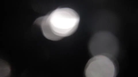 White bokeh light effect flashing at night 스톡 동영상 318159510