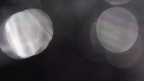 White bokeh light leaks in the dark 스톡 동영상 318918587