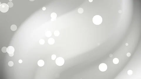 White bokeh lights on blurred grayscale background Stock Footage 321099120