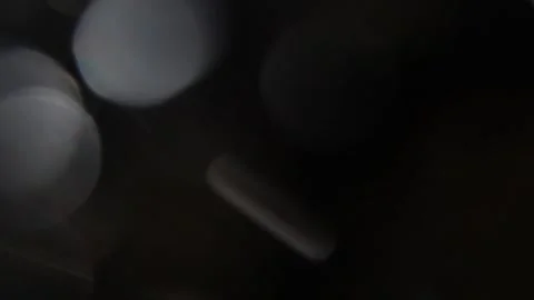 White bokeh ring of light shines in the dark Stockbeeldmateriaal 317537209