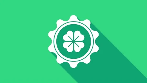 White Bottle cap with four leaf clover icon isolated on green background. Happy Stock Footage 146952011