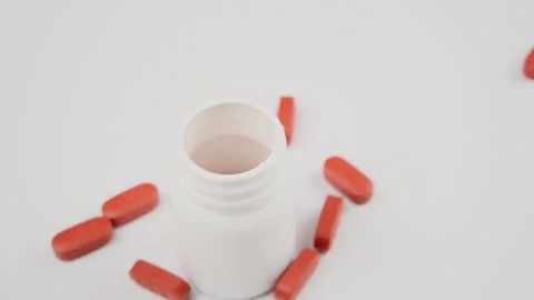 White bottle with pills on a white background health concept. Stock Footage 278219513