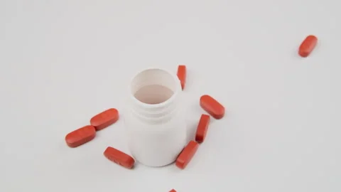 White bottle with pills on a white background health concept. Stock Footage 279653812