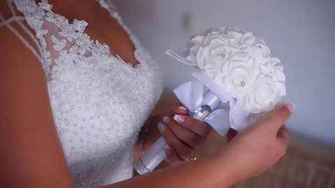 White bouquet in bride's hands Stock Footage 126733142