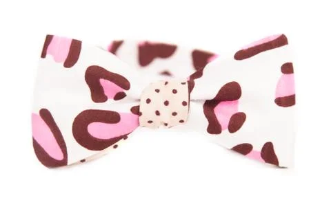 White bow tie with random bright spots of red hue Stockfoto's