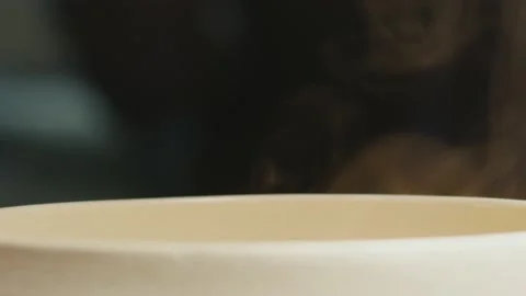 A white bowl of soup is on the table Stock-Footage 223158482