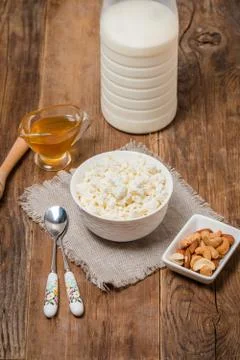 White bowl of tasty cottage cheese Stock Photos