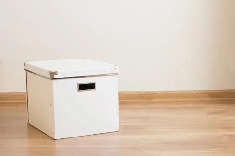 White box on the floor of empty room Stock Photos