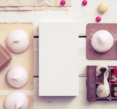 White box mockup between sweets on the table Stock Photos
