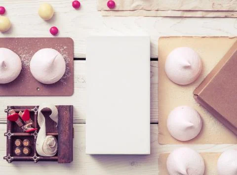 White box mockup between sweets on the table 스톡 사진