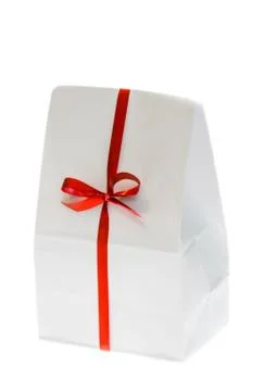 White box with red bow. Stock Photos