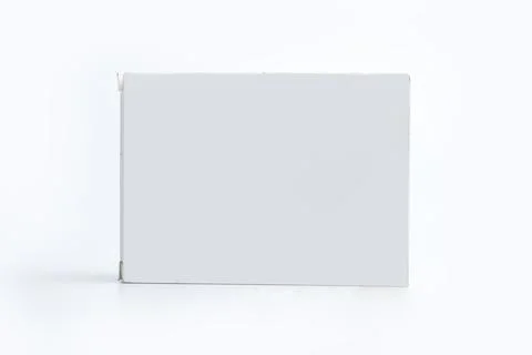 A white box stands on a white background. Stock Photos