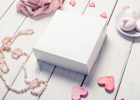 White box on white table Stock Photos