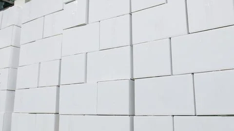 White boxes stacked in warehouse storage area logistics Stock Photos